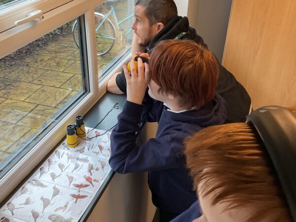 Outdoor learning at Allerthorpe SEN School as learners observe and record birds for the National Bird Count.