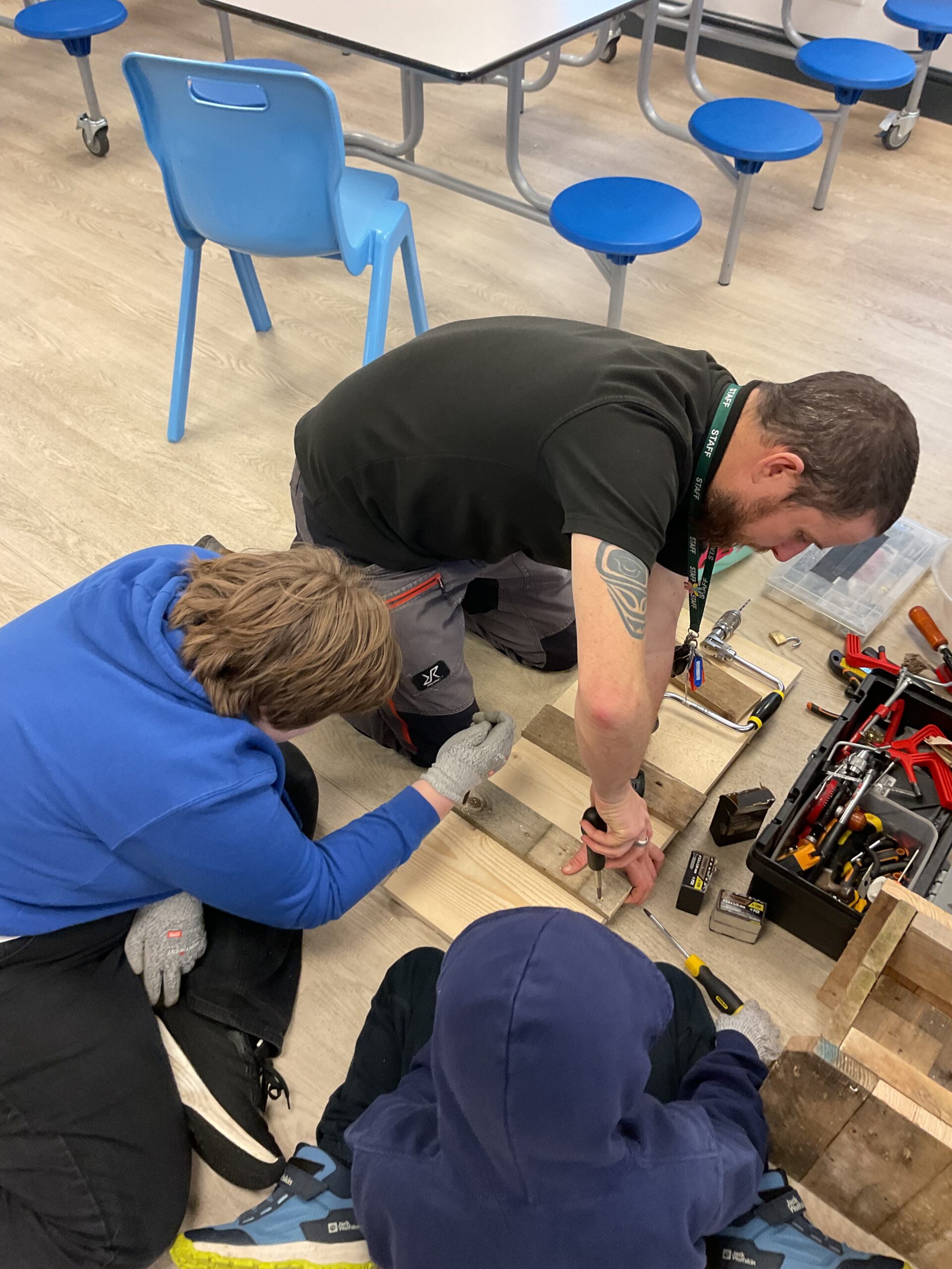 Inclusive Forest School learning in action as learners build animal homes to protect local wildlife.