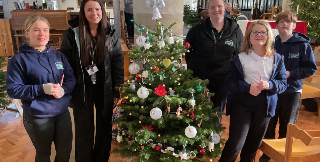 Learners from Allerthorpe Special Educational Needs School decorating their Christmas tree for the annual Pocklington Church Tree Festival at All Saints’ Church.