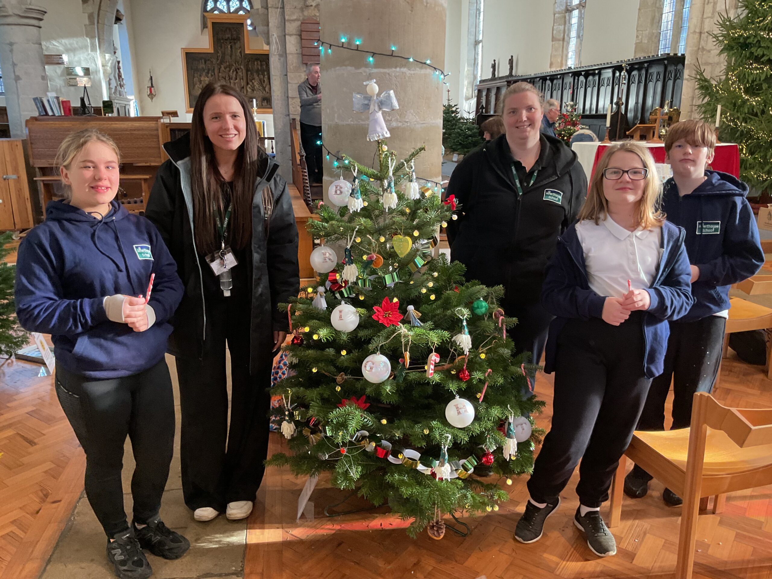 Learners from Allerthorpe Special Educational Needs School decorating their Christmas tree for the annual Pocklington Church Tree Festival at All Saints’ Church.